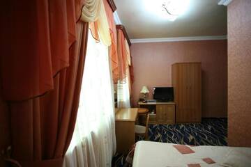 Фото номера Стандартный одноместный номер с балконом Отель Nairi Hotel г. Джермук 6
